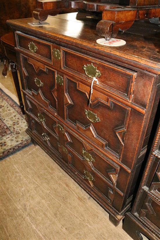 Oak chest, circa 1800, fitted four long drawers with mitred fronts